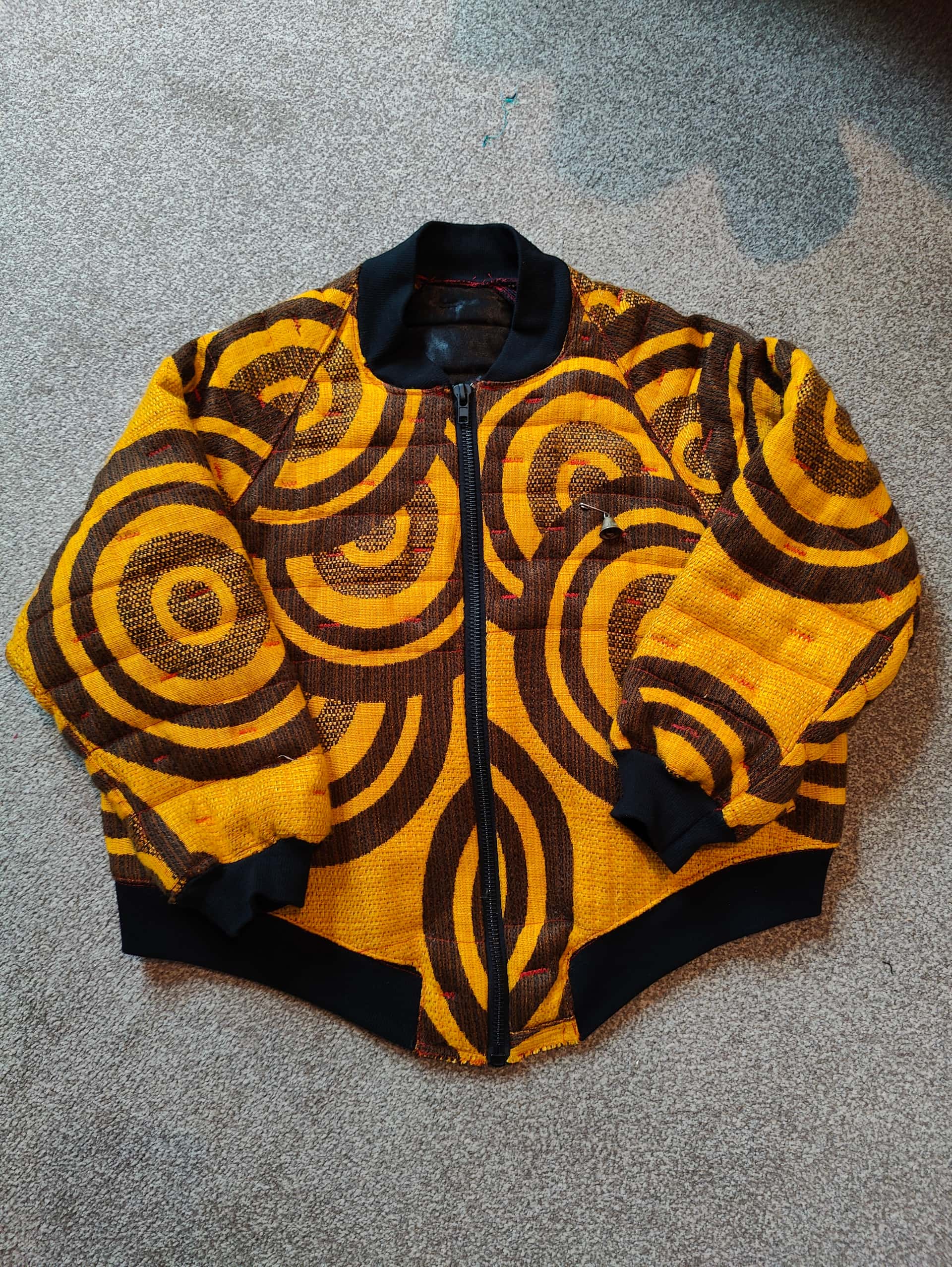 Bomber jacket made from reclaimed curtain fabric