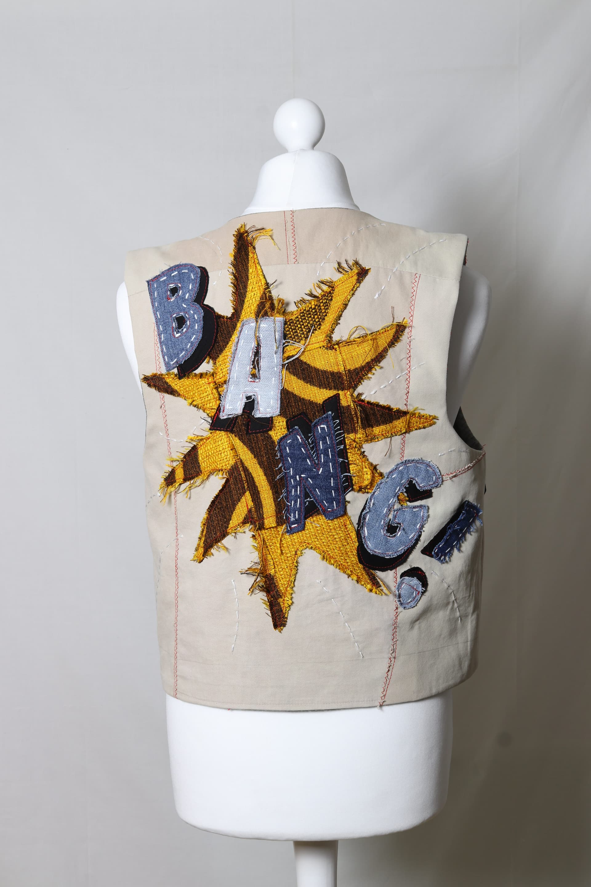 Pop art applique utility vest back view