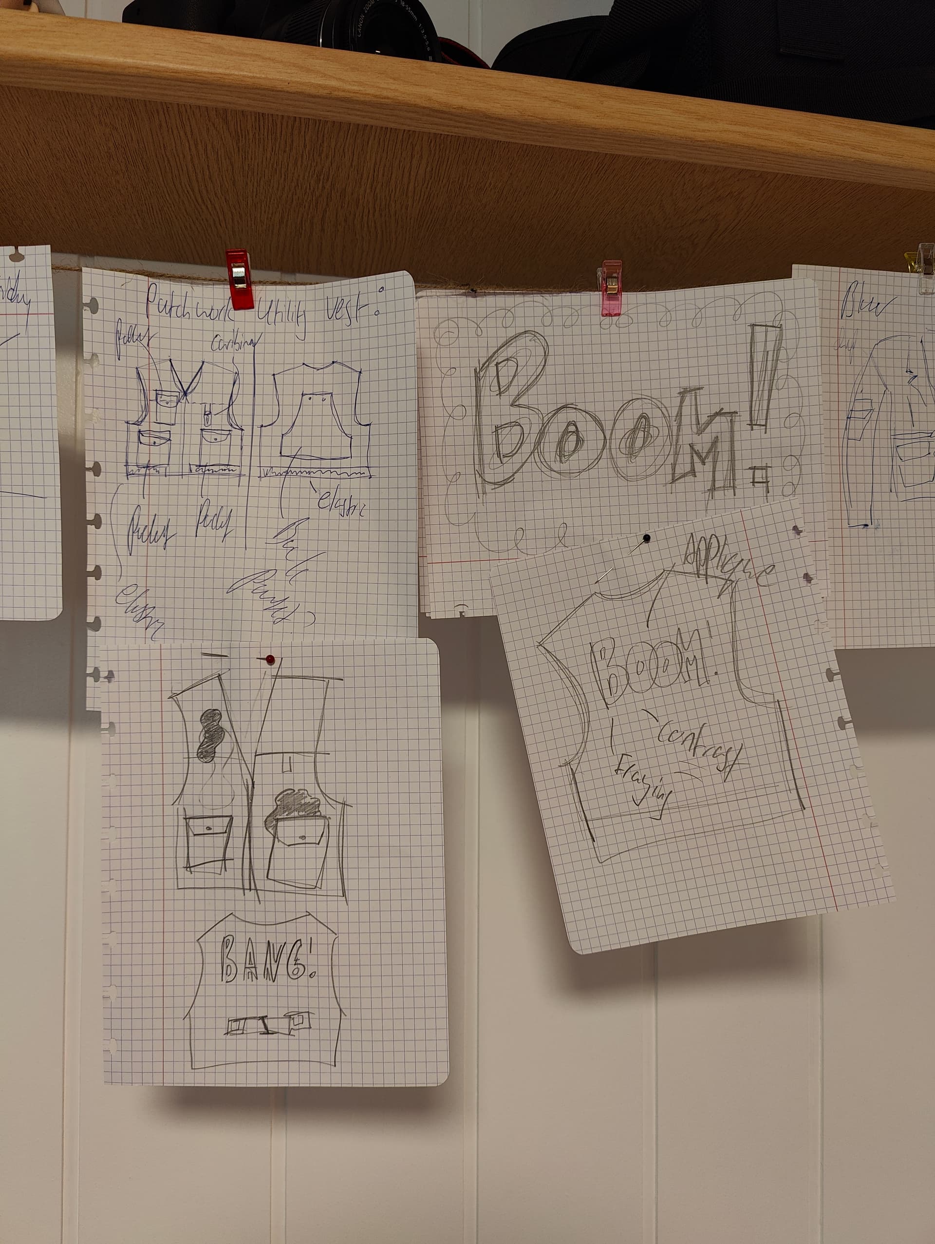 Sketch of utility vest concept with pop art applique