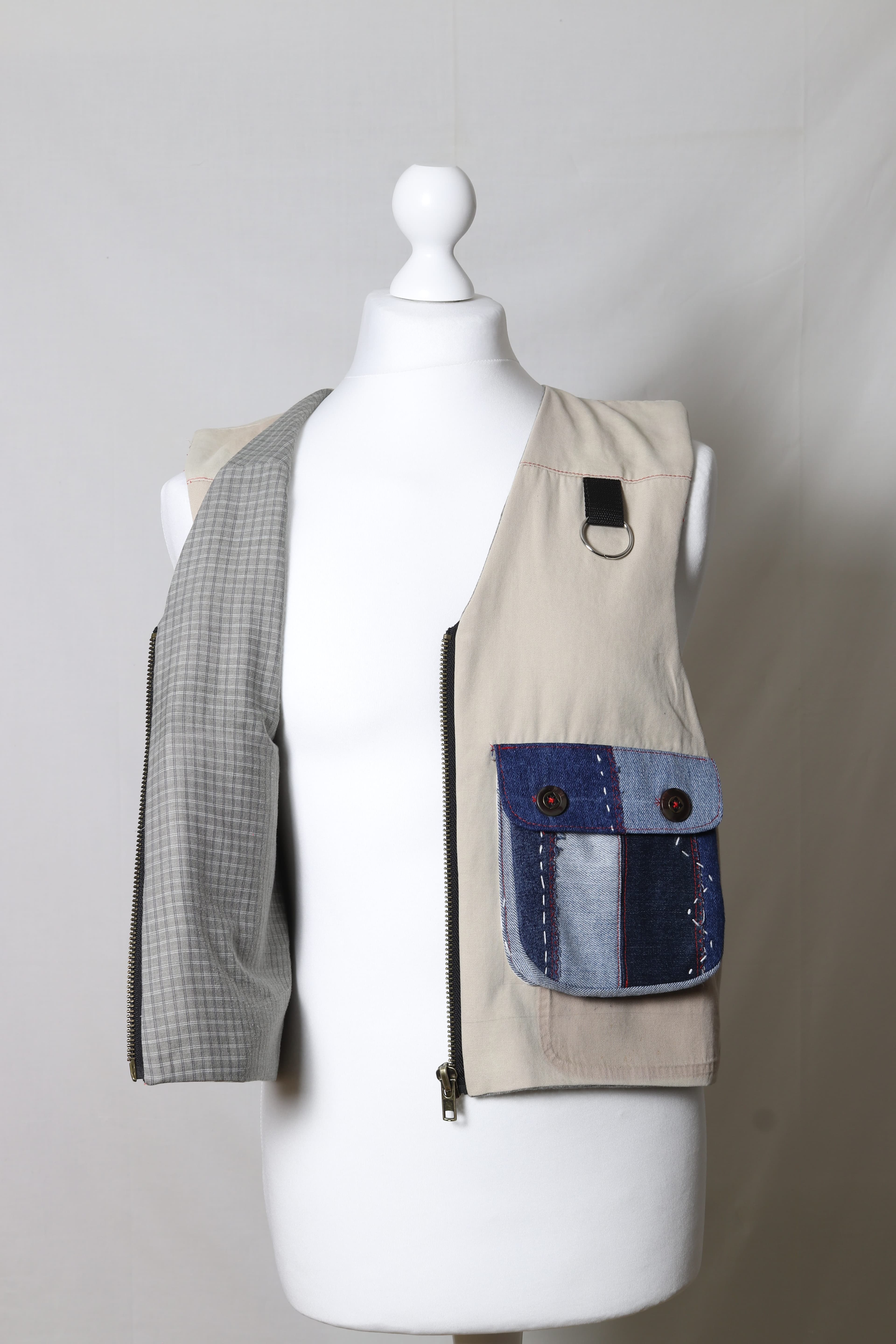 Patchwork utility vest made from reclaimed fabric