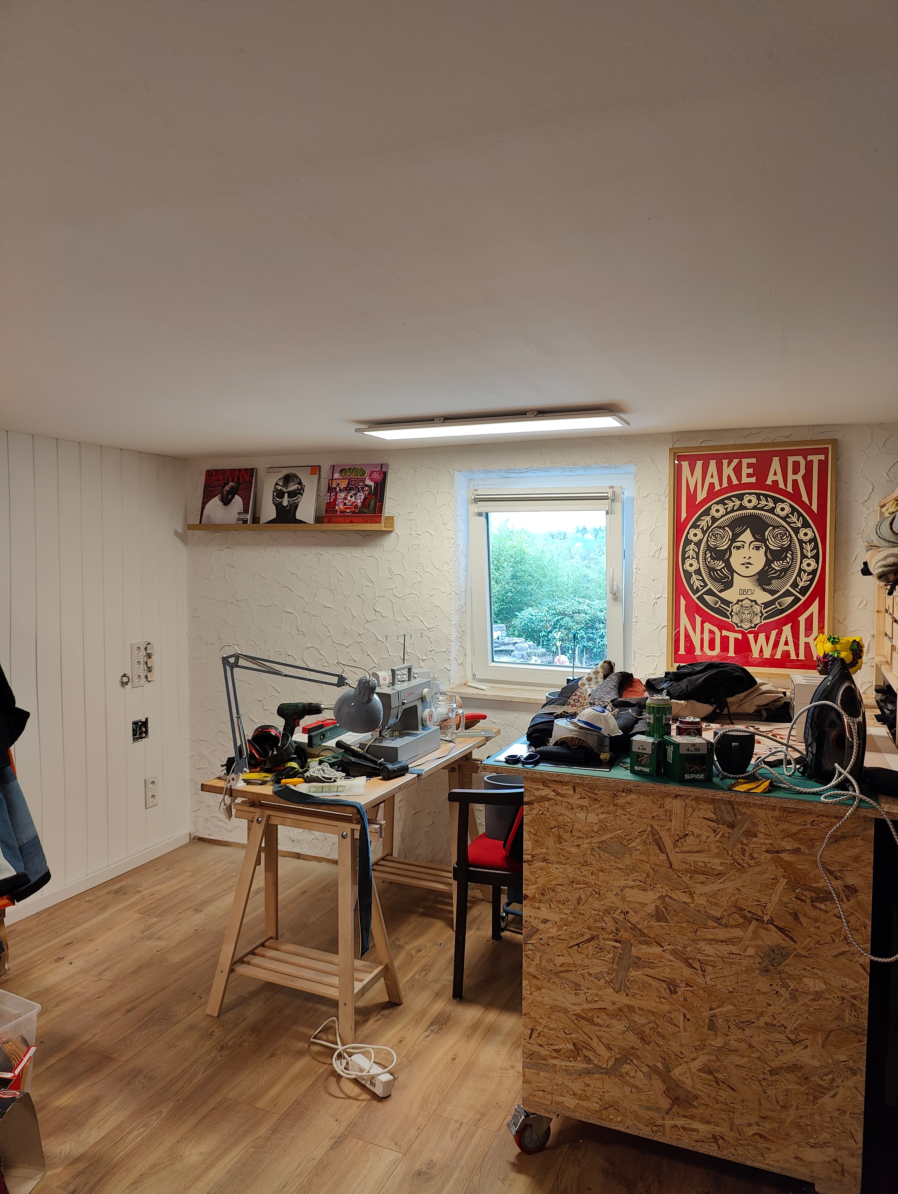 Studio workspace with mannequin and mirror